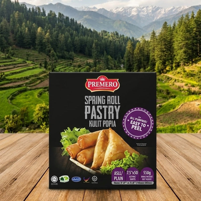 Premero spring roll pastry packaging on a wooden surface with a scenic background of mountains and trees.