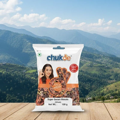 Chukde product packaging on a wooden surface with a scenic mountain background