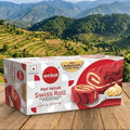 Winkies Red Velvet Swiss Roll packaging with a scenic mountain background