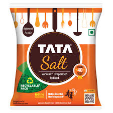 Tata Salt packaging with branding and recycling information on a white background