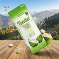 Tendo coconut water packaging with a scenic background of mountains and trees.