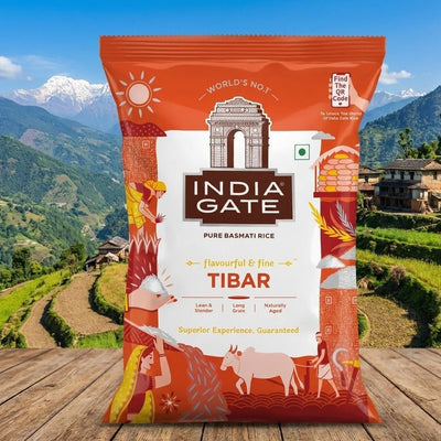 India Gate rice package with a scenic background of mountains and greenery