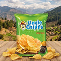 Packaging of Uncle Chipps Spicy Treat chips with a scenic background