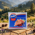 Venky's Chicken Sausages package on a wooden table with a mountainous landscape in the background