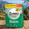 Zandu Balm box with a scenic mountain background